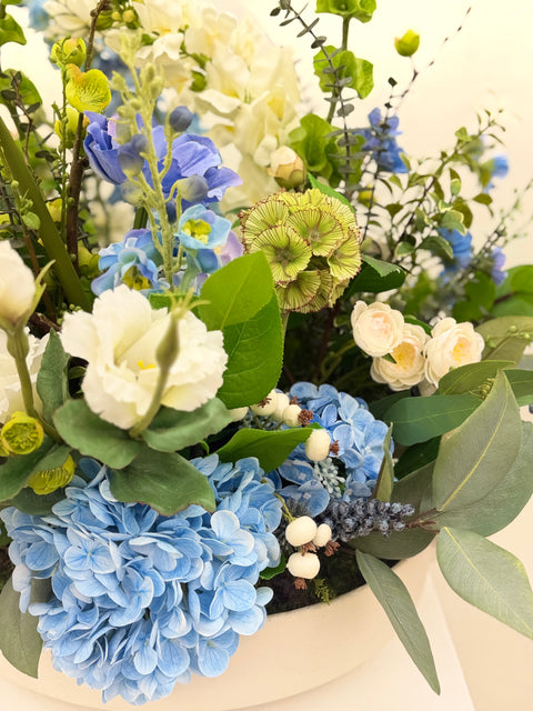 Garden-Inspired Blue Hydrangea & Delphinium Arrangement in Contemporary Ceramic Bowl